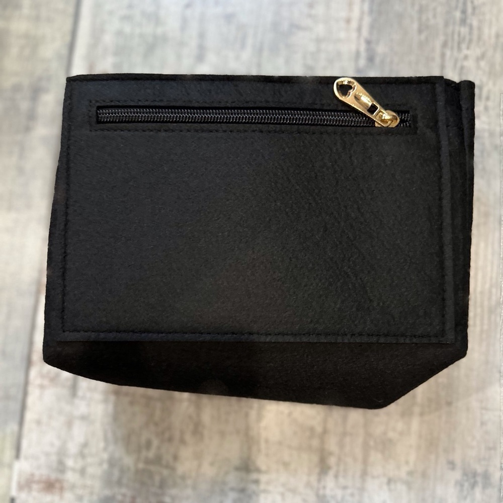 Small black felt storage bin